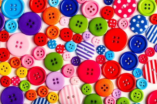 collection of multi-colored buttons for clothes