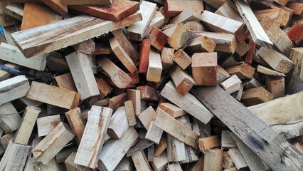 A pile of waste of the wood industry in urban which still can use to be recycled
