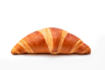 Fresh traditional croissant isolated on white.