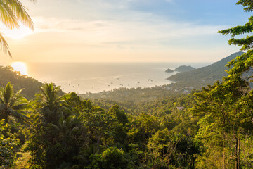 Landscape panorama of tropical Koh Tao island in Thailand. Greenery, nature and view on sea and shore from the high-angle during the sunset