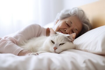 An Old Woman And Cat Sleeping Together In White Bed. Сoncept Elderly Companionship, Intergenerational Love, Feline Snuggles, Peaceful Slumber