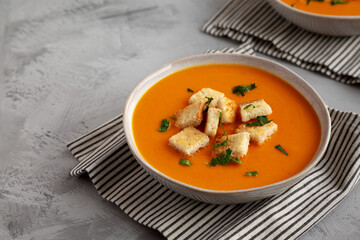 Homemade Butternut Squash Soup in a Bowl, side view.