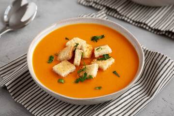 Homemade Butternut Squash Soup in a Bowl, side view.