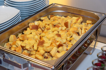 traditional austrian Kaiserschmarrn with sugar in a big bowl