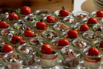 flaw angle view on many glasses with antipasti