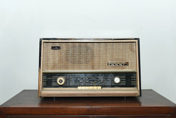 Old tube radio antique made in Indonesia frequency sw mw on the table