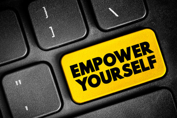 Fototapeta premium Empower Yourself - making a conscious decision to take charge of your destiny, text concept button on keyboard