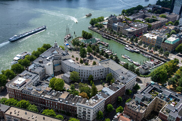 Aerial view of the Veerhaven harbor in Rotterdam, the Netherlands surrounded by historic buildings of the riverside Nieuwe Werk or Scheepvaartkwartier along the Nieuwe Maas river