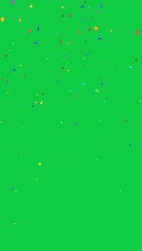 4K vertical. seamless looping of particle animation of colorful confetti falling down decoration for party celebration isolated on chroma key green screen background for overlay motion graphic