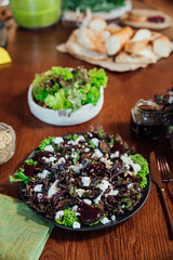 Delicious food: beetroot, cheese and herbs salad with bread