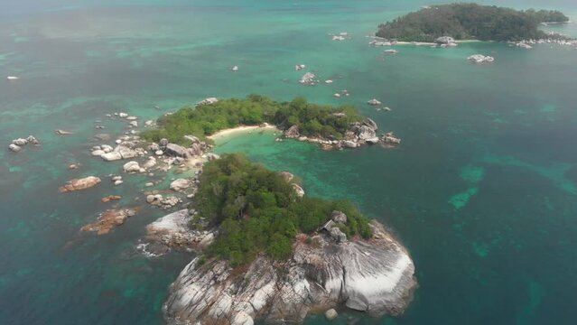 Drone view of small tropical island near Belitung Indonesia, aerial