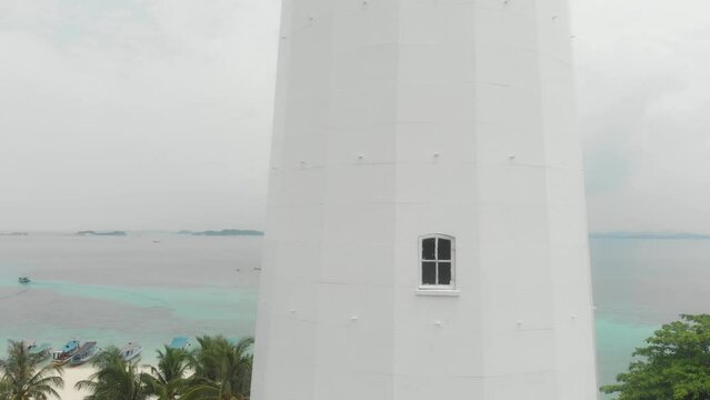 Close up shot of lighthouse at Lengkuas Island Belitung, aerial
