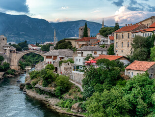 Historical Mostar Old town, Bosnia and Herzegovina, view of the Stari Most bridge, Neretva river and Balkan mountains