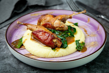  baked chicken wings with gravy, spinach and mashed potatoes top view