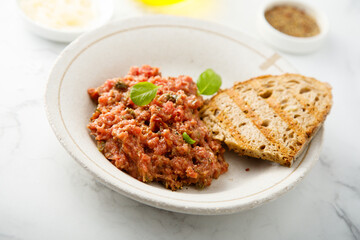 Traditional steak tartare with capers