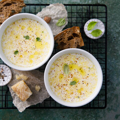 Warming cheesy soup with truffle oil