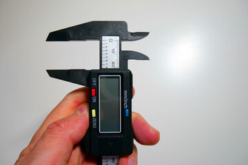 Measuring with a caliper. Electronic digital vernier caliper details and close-up