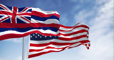 Hawaii state flag waving with the national flag of the United States of America