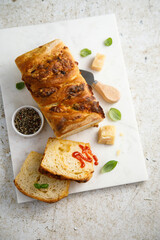 Homemade cheese bread with fresh basil