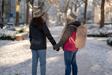 Adorable Winter Love Stroll of female couple