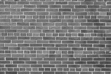 Obraz premium Black and white photo of brick wall in loft style