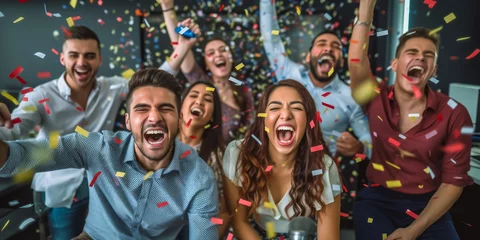 Foto op Aluminium Joyful diverse group of friends or colleagues celebrating with confetti, cheering and laughing together in a festive atmosphere at a party or successful corporate event © Bartek