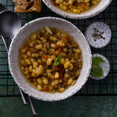 Warming white bean soup with mushrooms