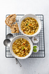 Warming white bean soup with mushrooms