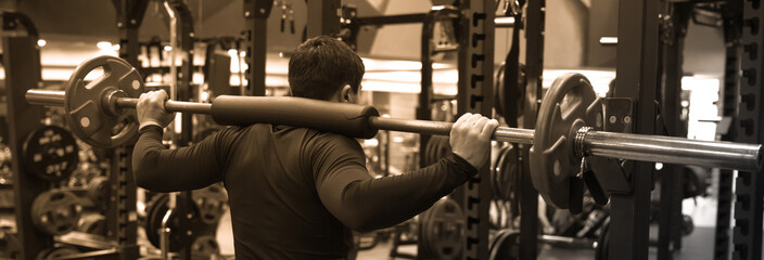 A trained man in a fitness club