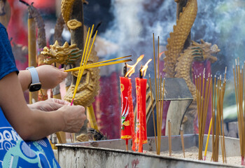 2023 June 03,Hong Kong.Citizens light incense and candles to pray for blessings from gods