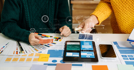  UX developer and ui designer brainstorming about mobile app interface wireframe design with customer breif and color code