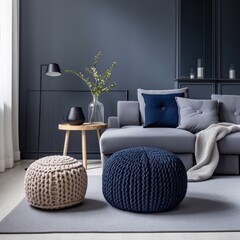 A living room with a gray couch and blue pillows. Scandinavian home interior design of modern living home.