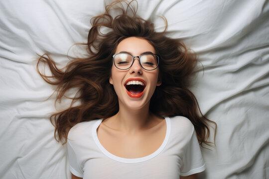 smiling woman in bed