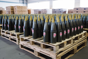 artillery shells on pallets in the warehouse - obrazy, fototapety, plakaty