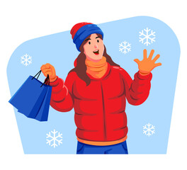 Woman in winter clothes holding shopping bags