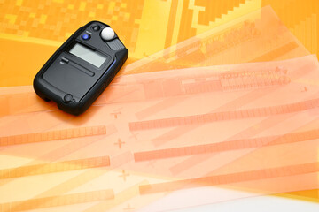 Lightmeter on flexo printing plate close-up    
