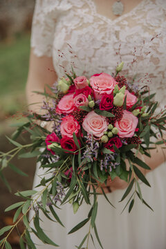 wedding bouquet of pink and red roses