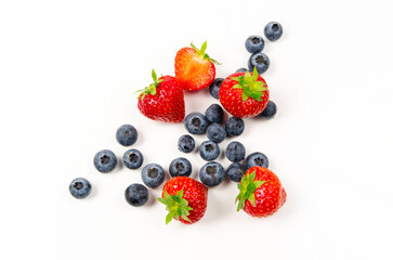 Strawberry and blueberries in white background