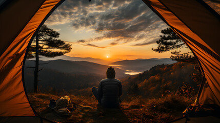 Traveler Relaxes Inside an Orange Tent, Savoring the Autumn Forest Views