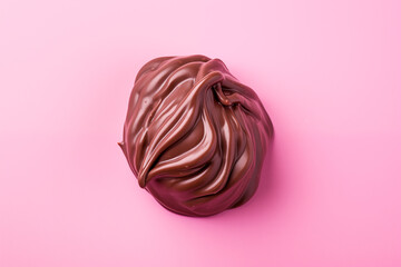 hazlenut chocolate close up against a vivid pink background