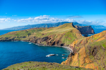 Fototapeta na wymiar Ponta de Sao Lourenco Madeira Portugal. Scenic mountain view of green landscape, cliffs and Atlantic Ocean. Hiking active day, travel background