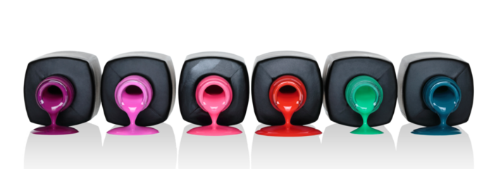 Cosmetic bottles with flowing nail polish on white background, cosmetic concept