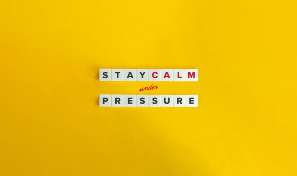 Stay Calm Under Pressure Banner. Text On Block Letter Tiles On Yellow Background. Minimalist Aesthetics.