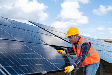 Installation of solar panels on solar panel plant.