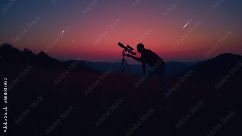 Wall mural astronomer looking at the stars, planets, moon and celestial objects with a telescope.