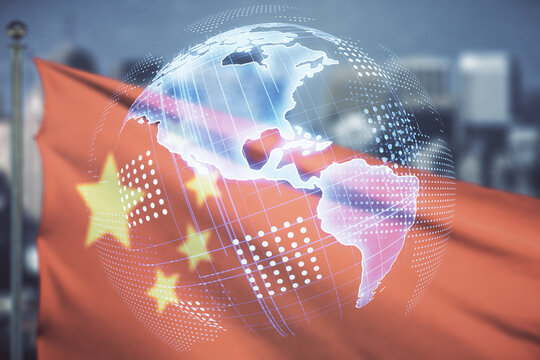 Virtual digital map of North America on flag of China and blurry skyscrapers background, international trading concept. Multiexposure
