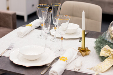 New Year's table setting. Glass festive tableware, Christmas