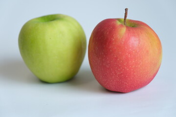 two apples green and red isolated