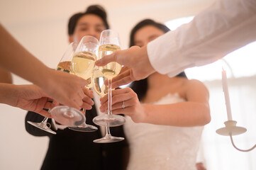 close up of Hands holding glasses of champagne at the wedding ceremony