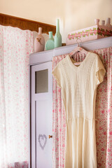   Country room in vintage style. Old wardrobe and old things.